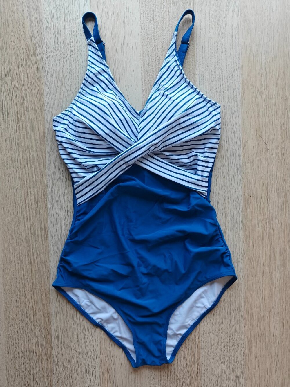WOMEN'S BLUE AND WHITE STRIPED TWIST-FRONT ONE PIECE SWIMSUIT (SIZE MEDIUM)